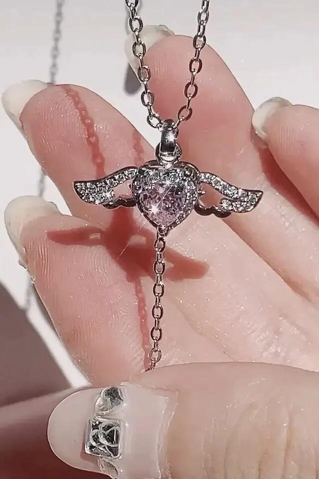 Pirinç Hareketli Kanatlı Kalp Gümüş Renk Kolye