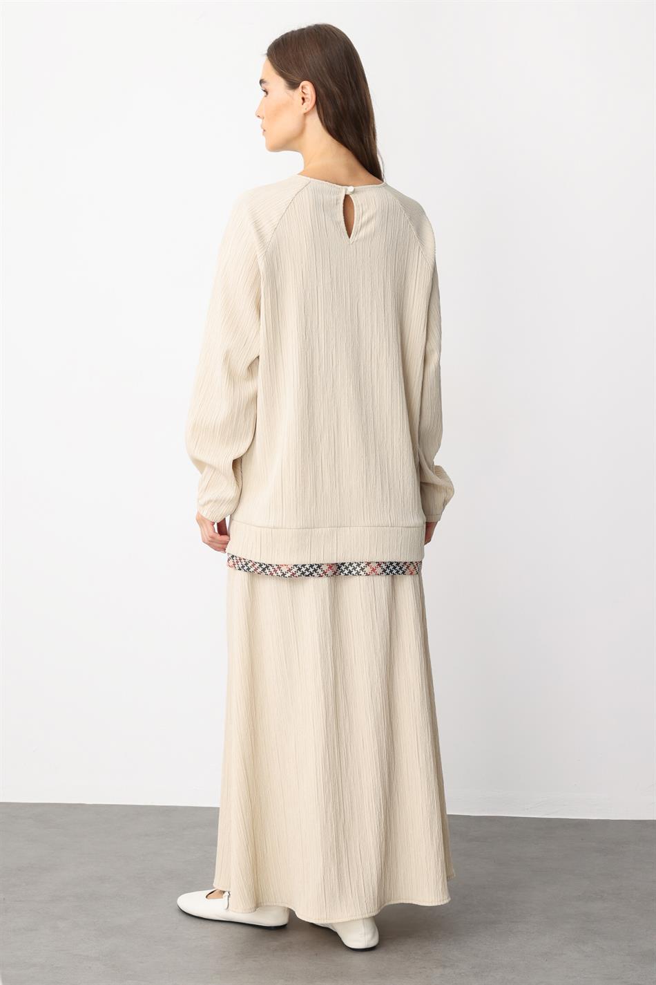 Elegante rokset met garni-details en een bijzonder geweven ontwerp - beige