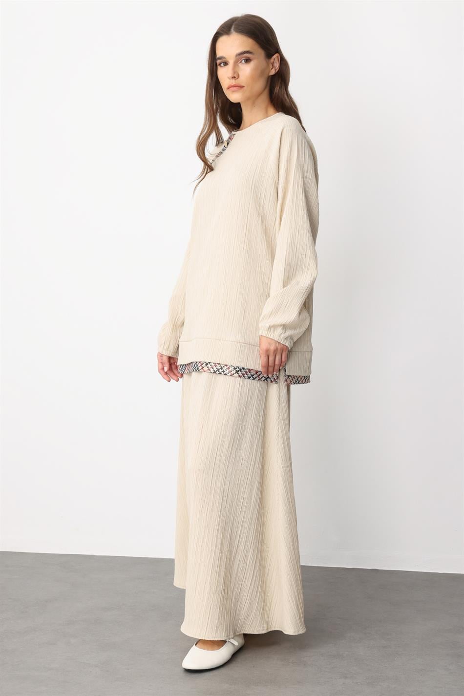 Elegante rokset met garni-details en een bijzonder geweven ontwerp - beige