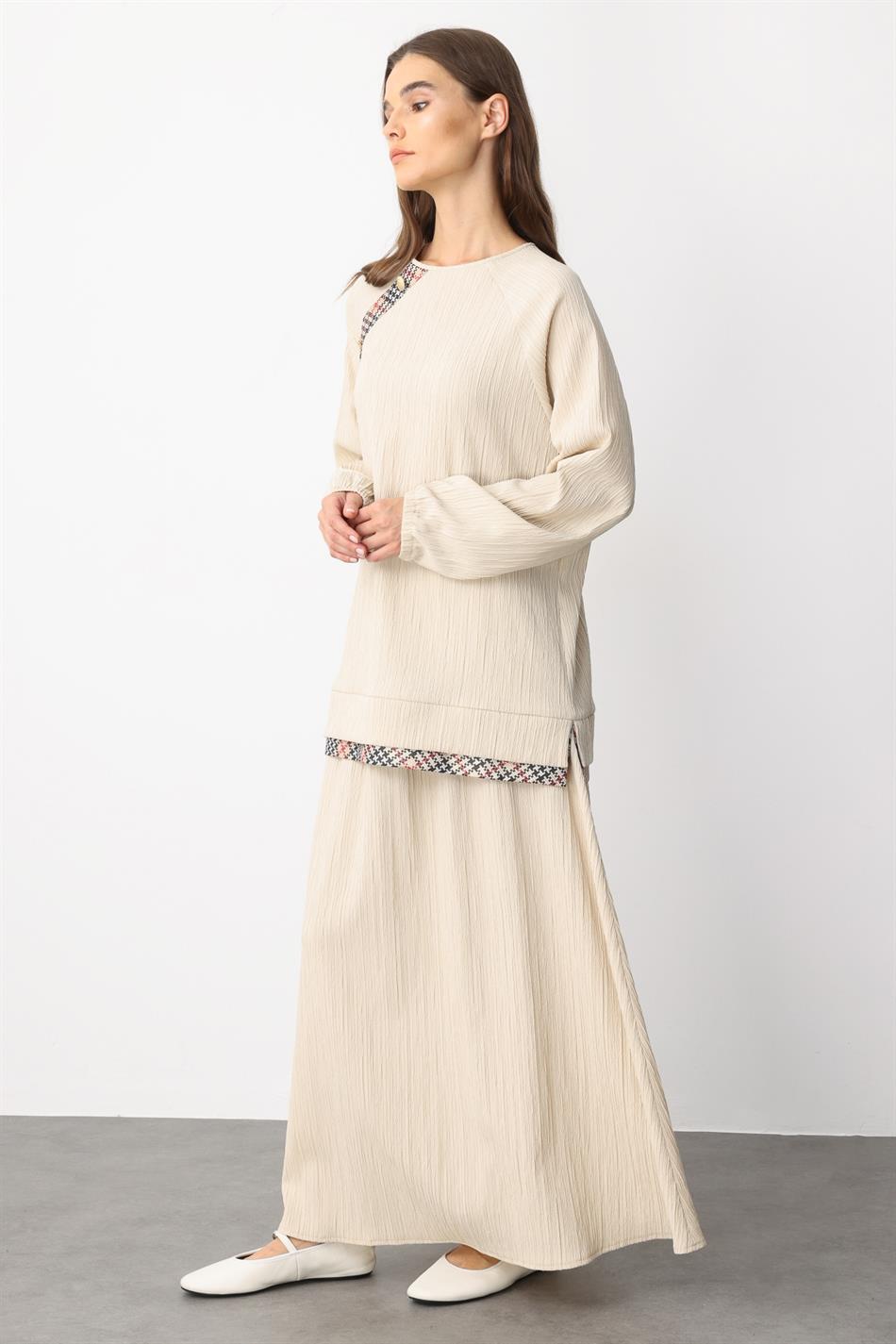 Elegante rokset met garni-details en een bijzonder geweven ontwerp - beige