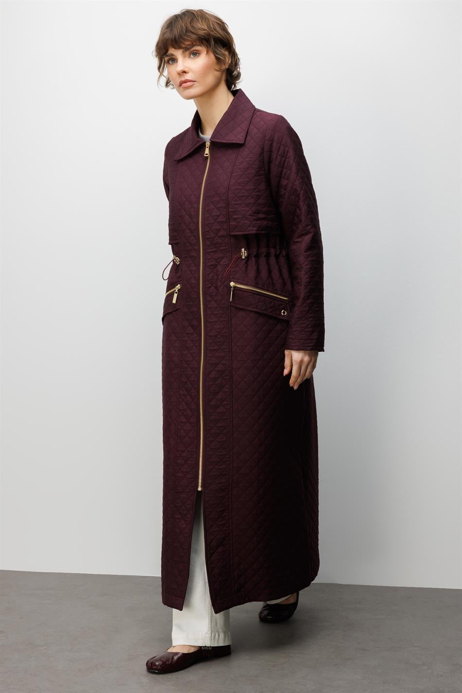 Lange jas met ritssluiting en zakken, gemaakt van jacquard gewatteerde stof - PAARS