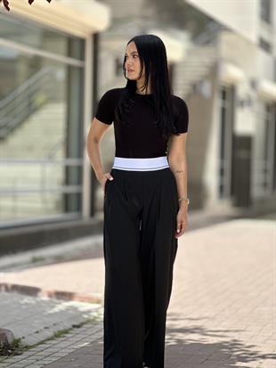 71306 ELASTIK BELLI GENIS BACAK OZEL
