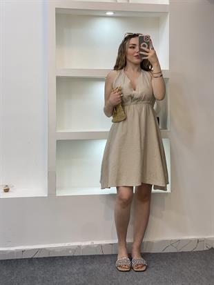 Bej Sırt Dekolteli Önü Nakışlı Model Müslin Elbise