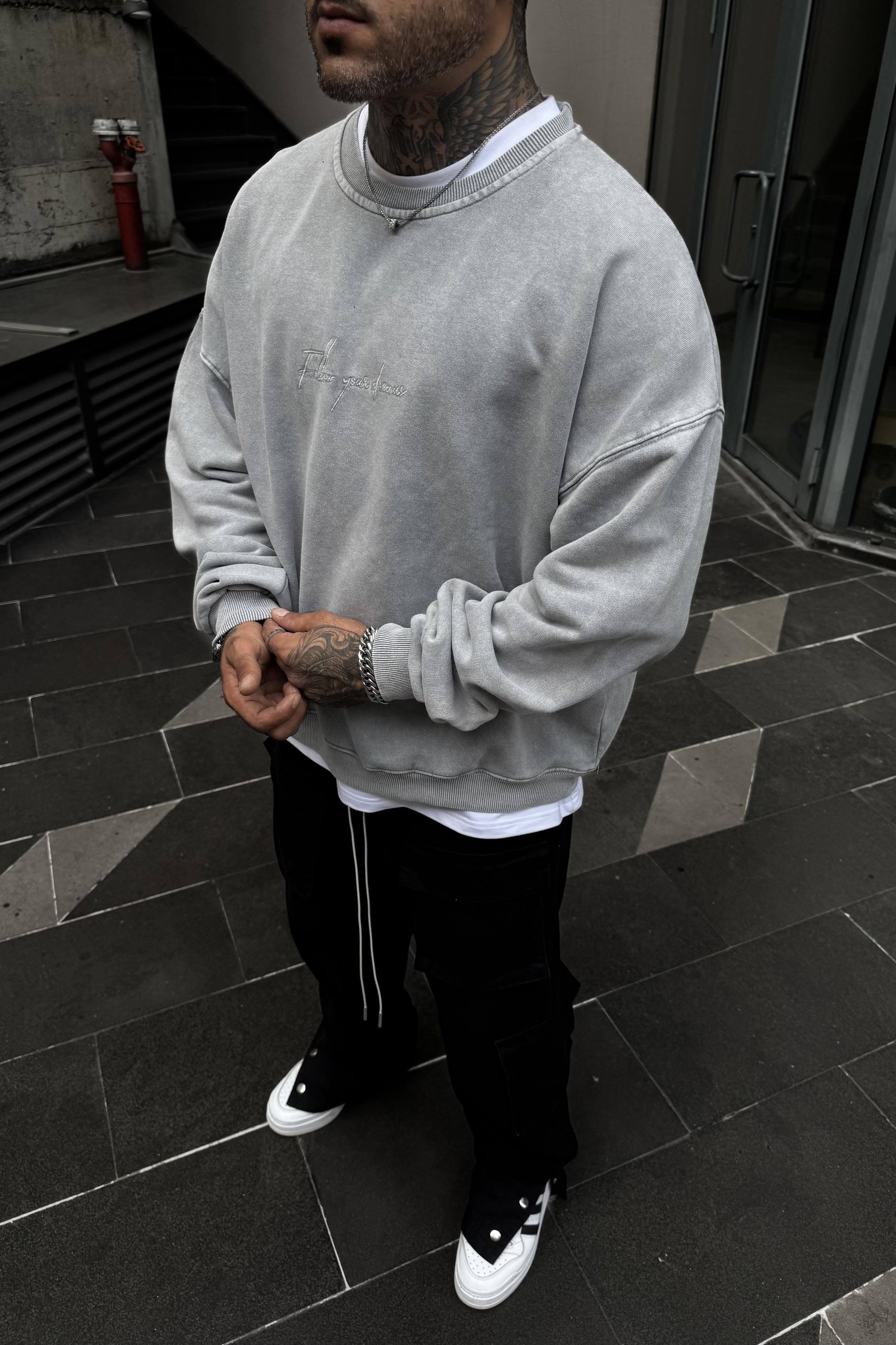 Acid wash haste never oversize sweatshirt