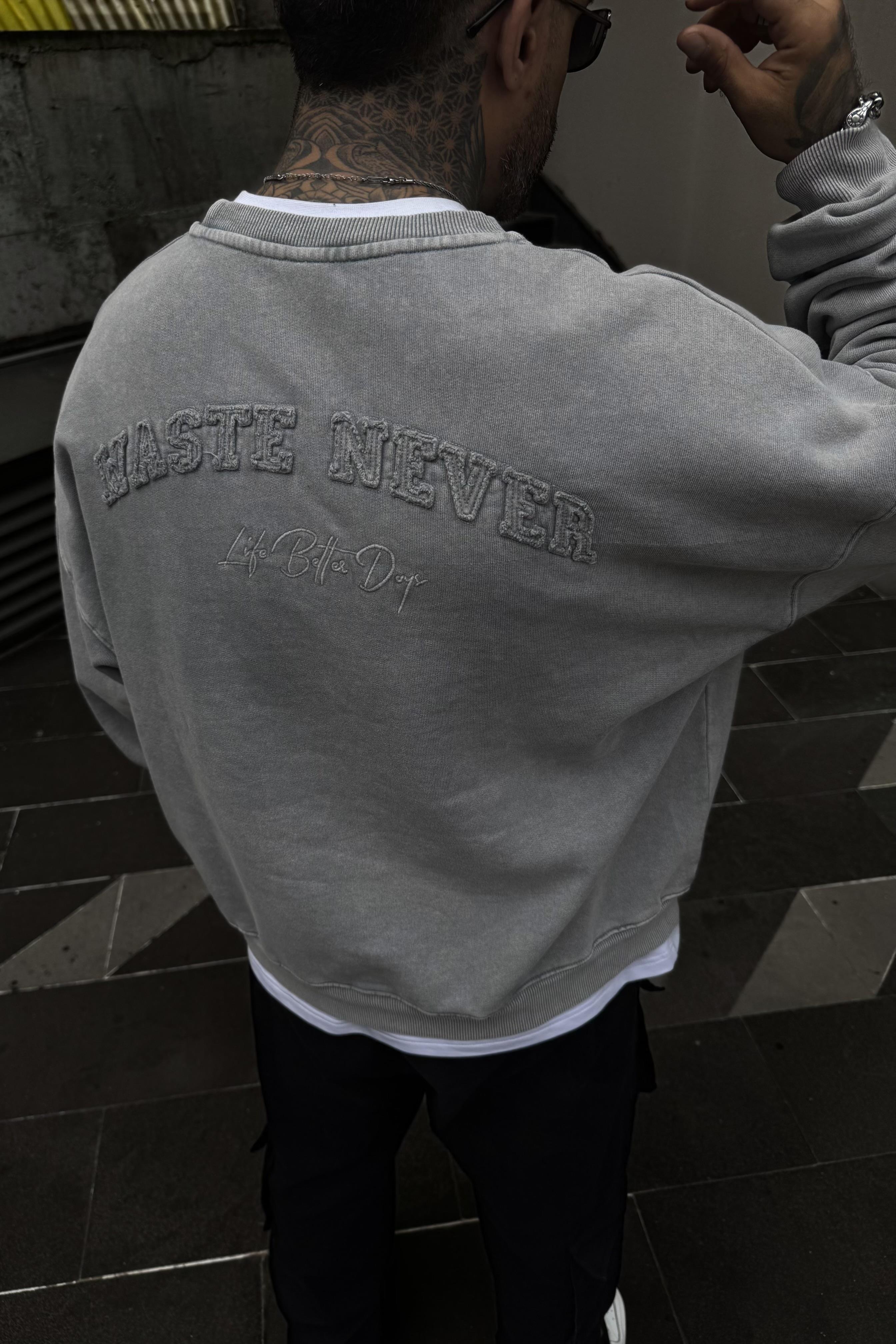 Acid wash haste never oversize sweatshirt