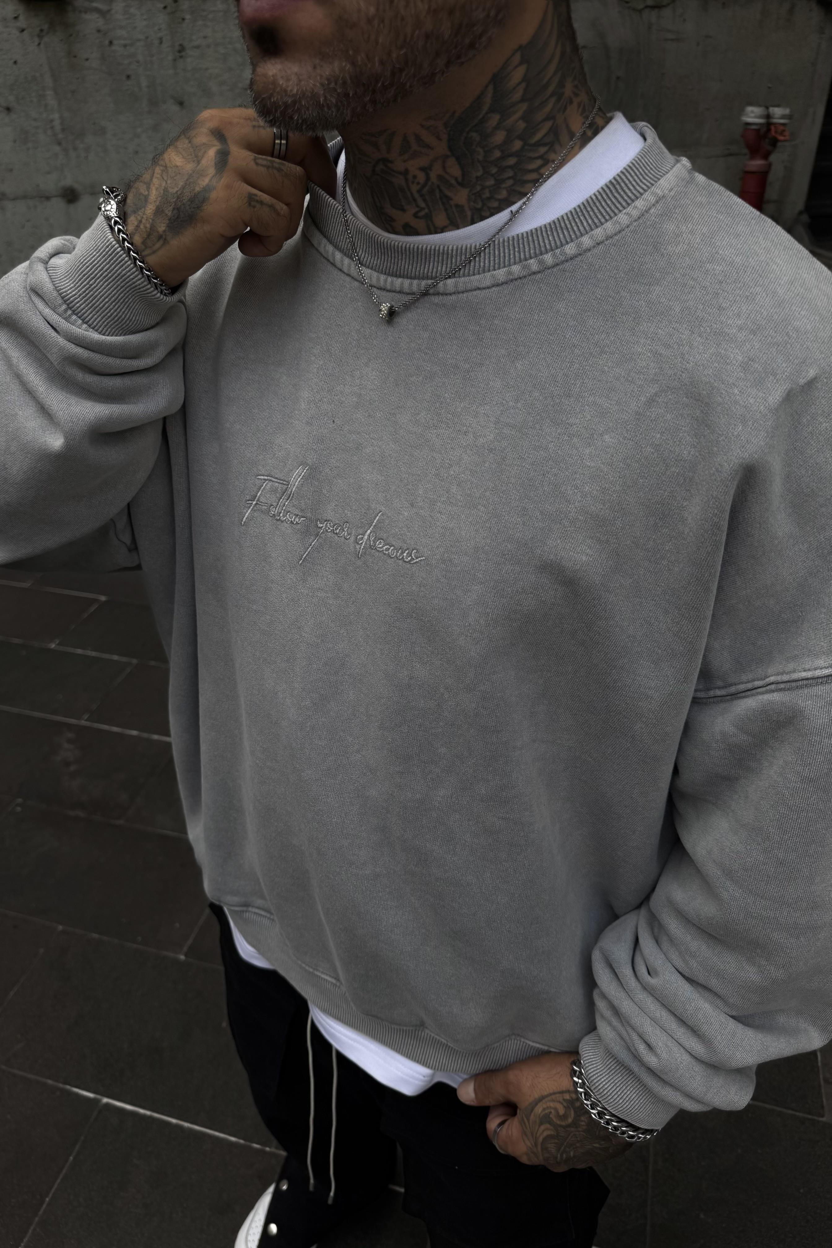 Acid wash haste never oversize sweatshirt