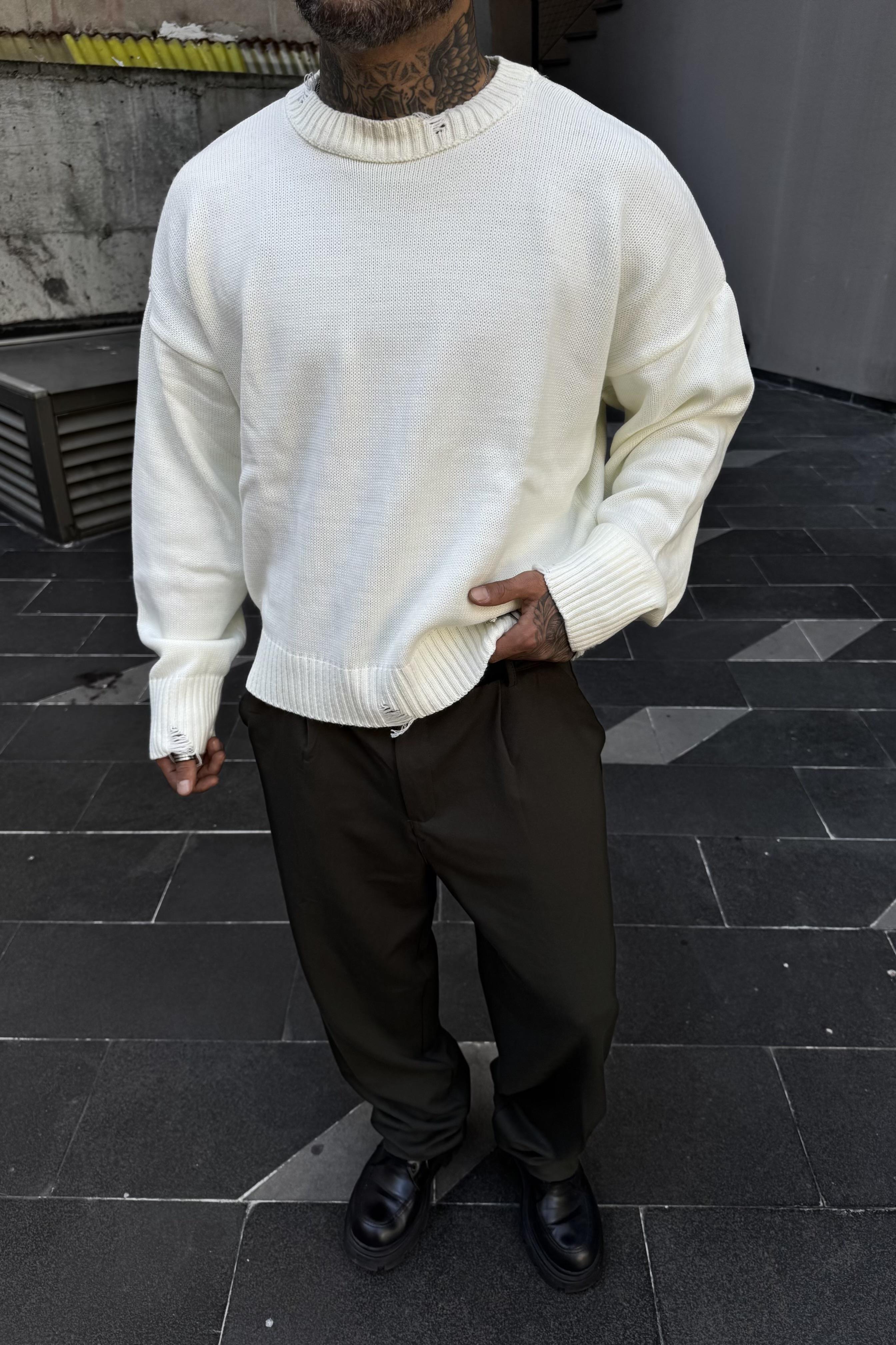 Distressed oversize white sweater