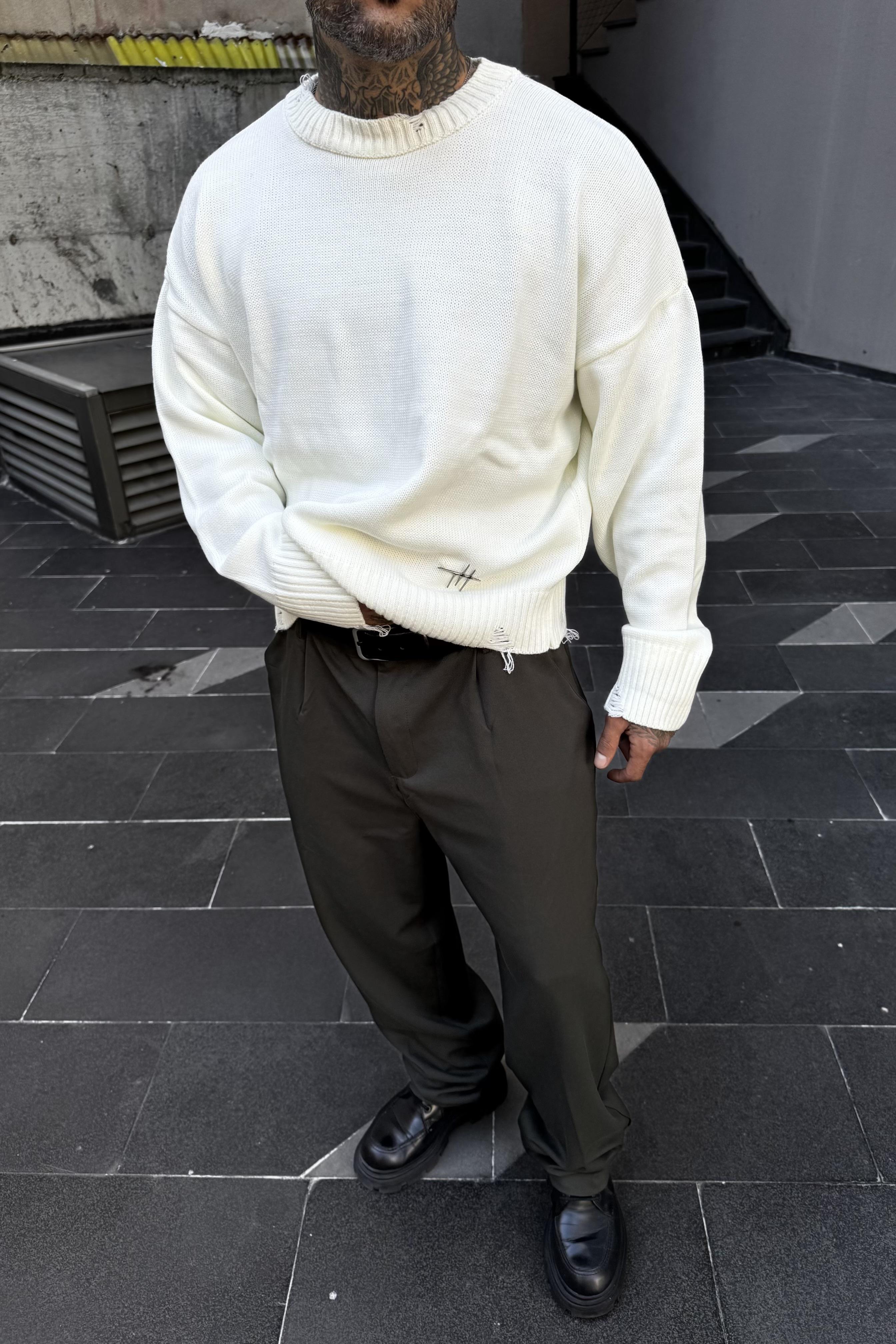 Distressed oversize white sweater