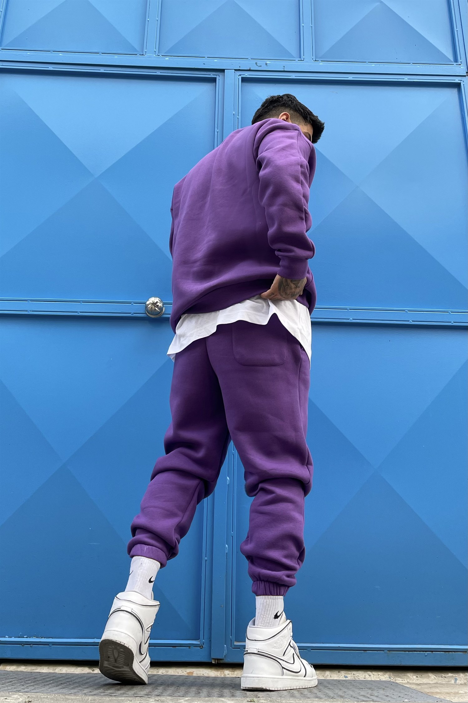 Purple track suit