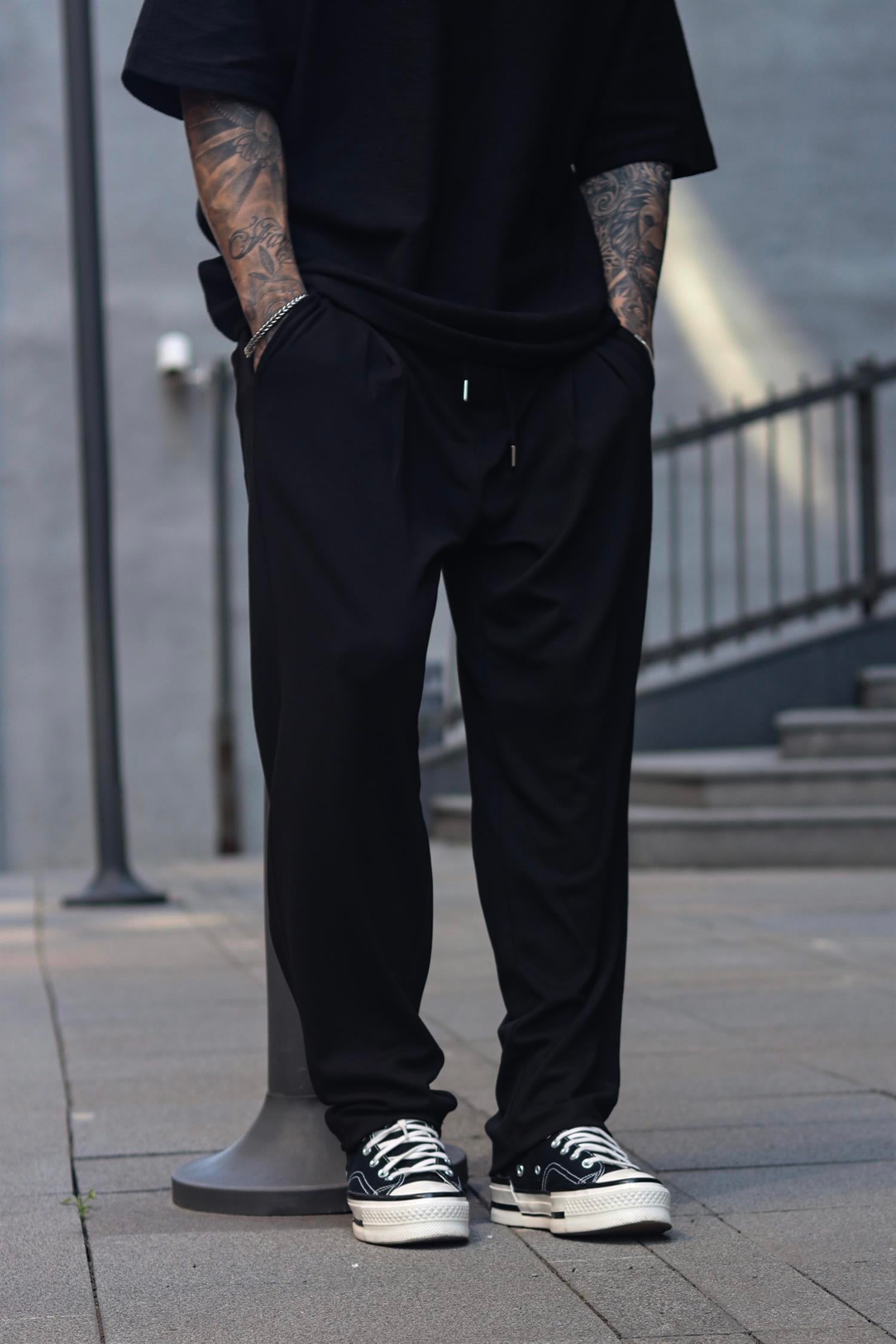 Siyah pileli pantolon