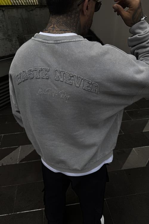 Acid wash haste never oversize sweatshirt