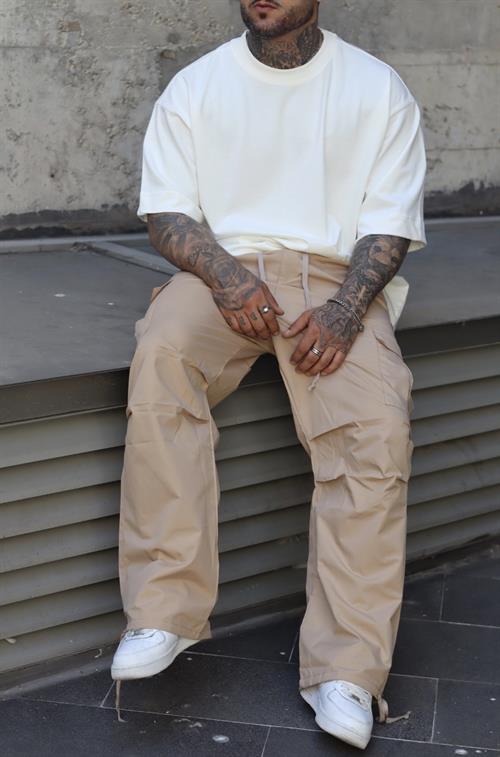 Bej ayarlanabilir paça pantolon