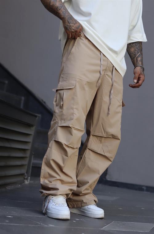 Bej ayarlanabilir paça pantolon