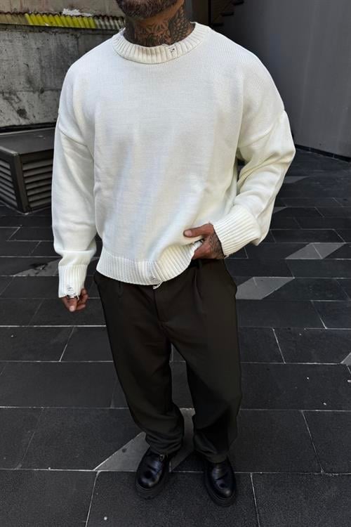 Distressed oversize white sweater