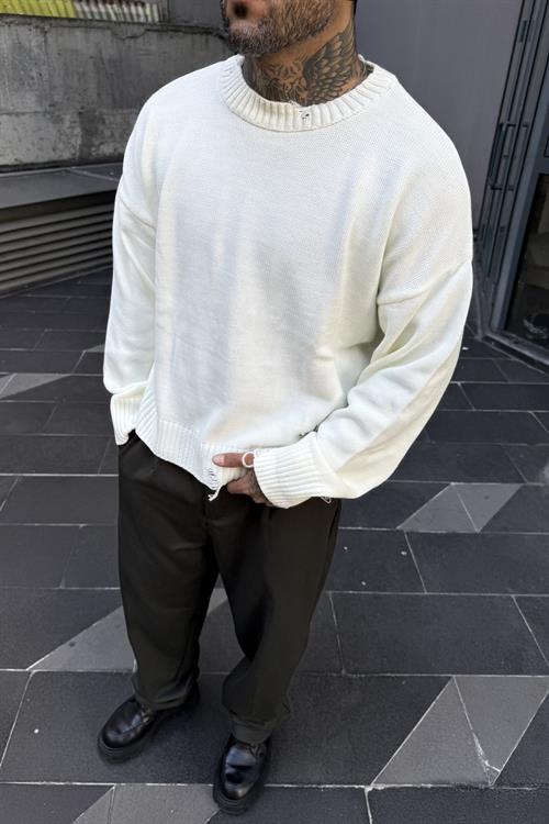 Distressed oversize white sweater