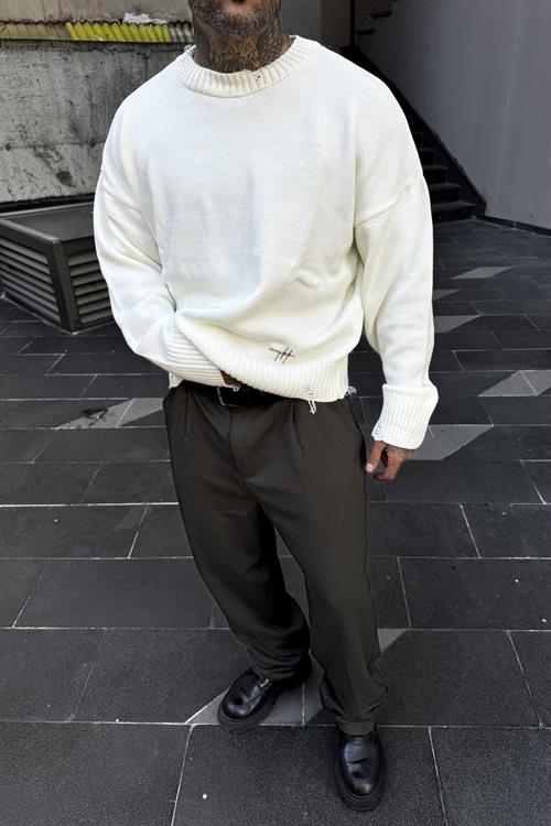 Distressed oversize white sweater