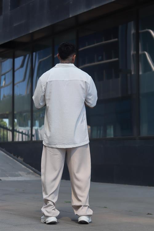 Oversize beyaz gömlek kabartma baskılı