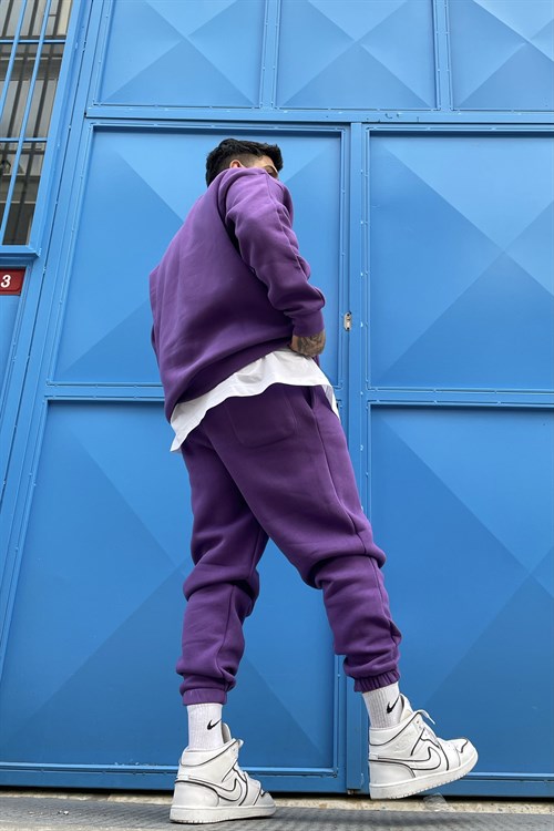 Purple track suit