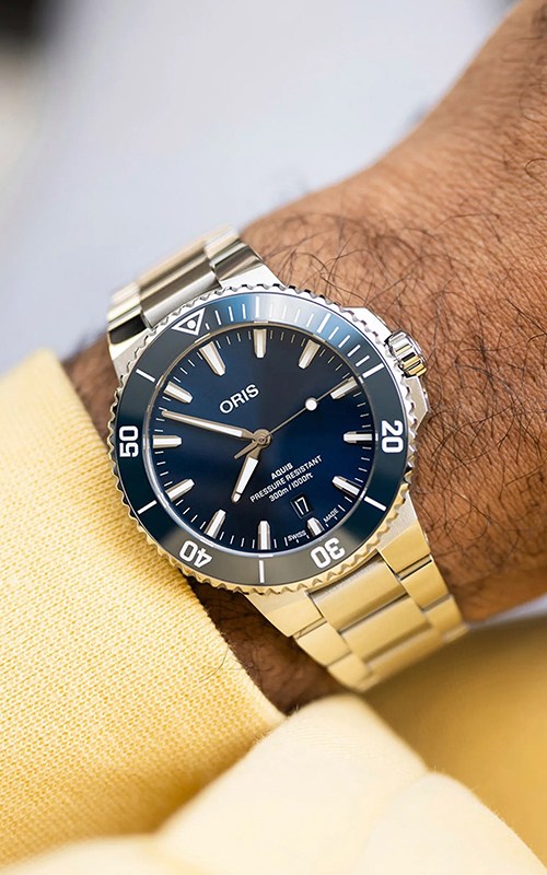 Oris 733 7787 4135-07 8 22 04PEB Aquis Date Erkek Kol Saati