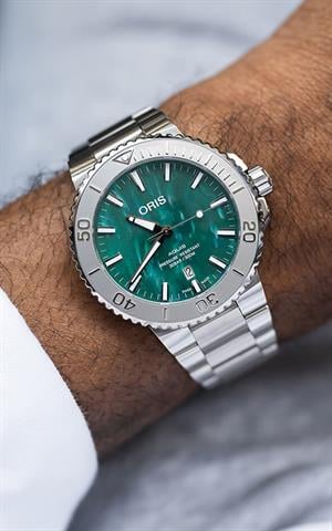 Oris 01 733 7730 4137 07 8 24 05PEB Aquis Erkek Kol Saati