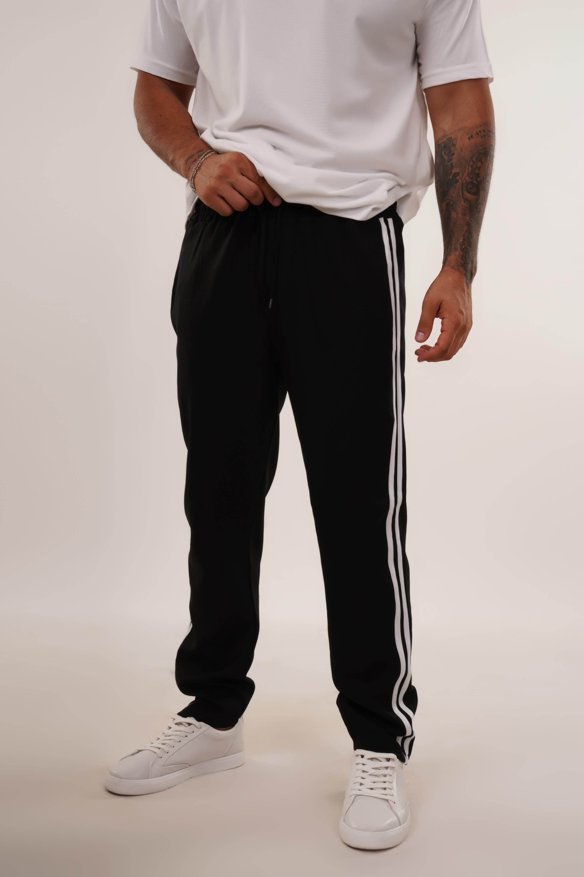 EŞOFMAN ALTI & JOGGERSiyah Dokuma Kumaş Yandan Çift Çizgi Baggy Pant. KNG