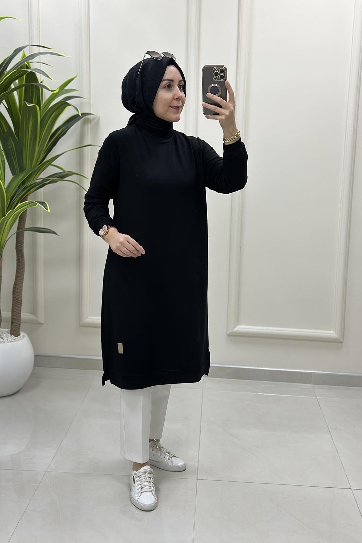 Tesettür Tunik Modelleriİnce Oysho Kol Ve Etek Ucu Ribanalı Spor Kadın Tunik Siyah KADO 7194