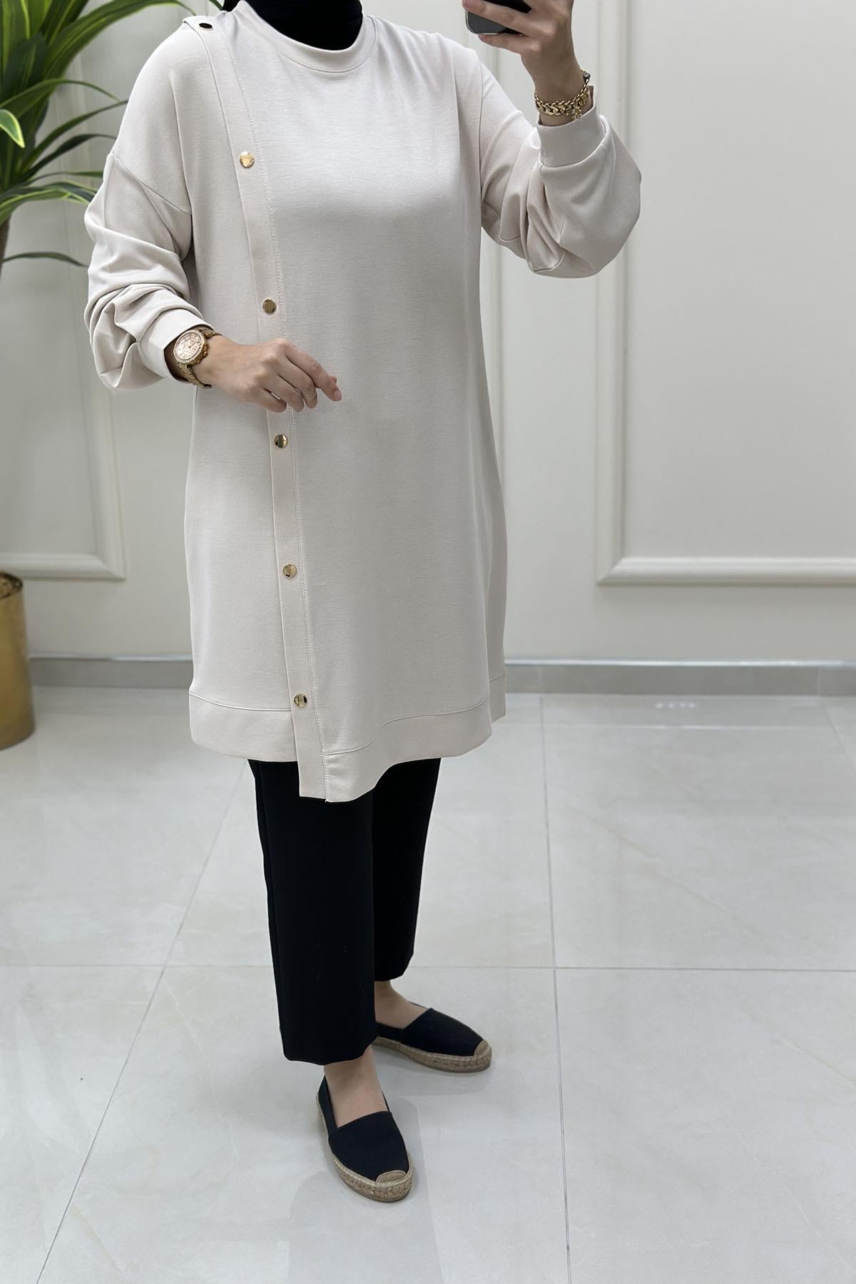 Tesettür Tunik ModelleriKol Pile Detaylı Önü Zımbalı Kadın Tunik Bej KADO 257002
