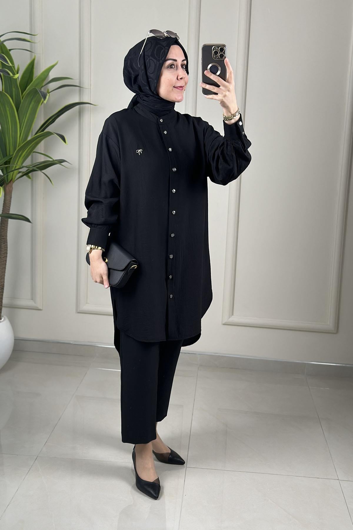 Tesettür Tunik ModelleriÖnü Düğmeli Aksesuar Detaylı Kadın Tunik Siyah KADO 262622