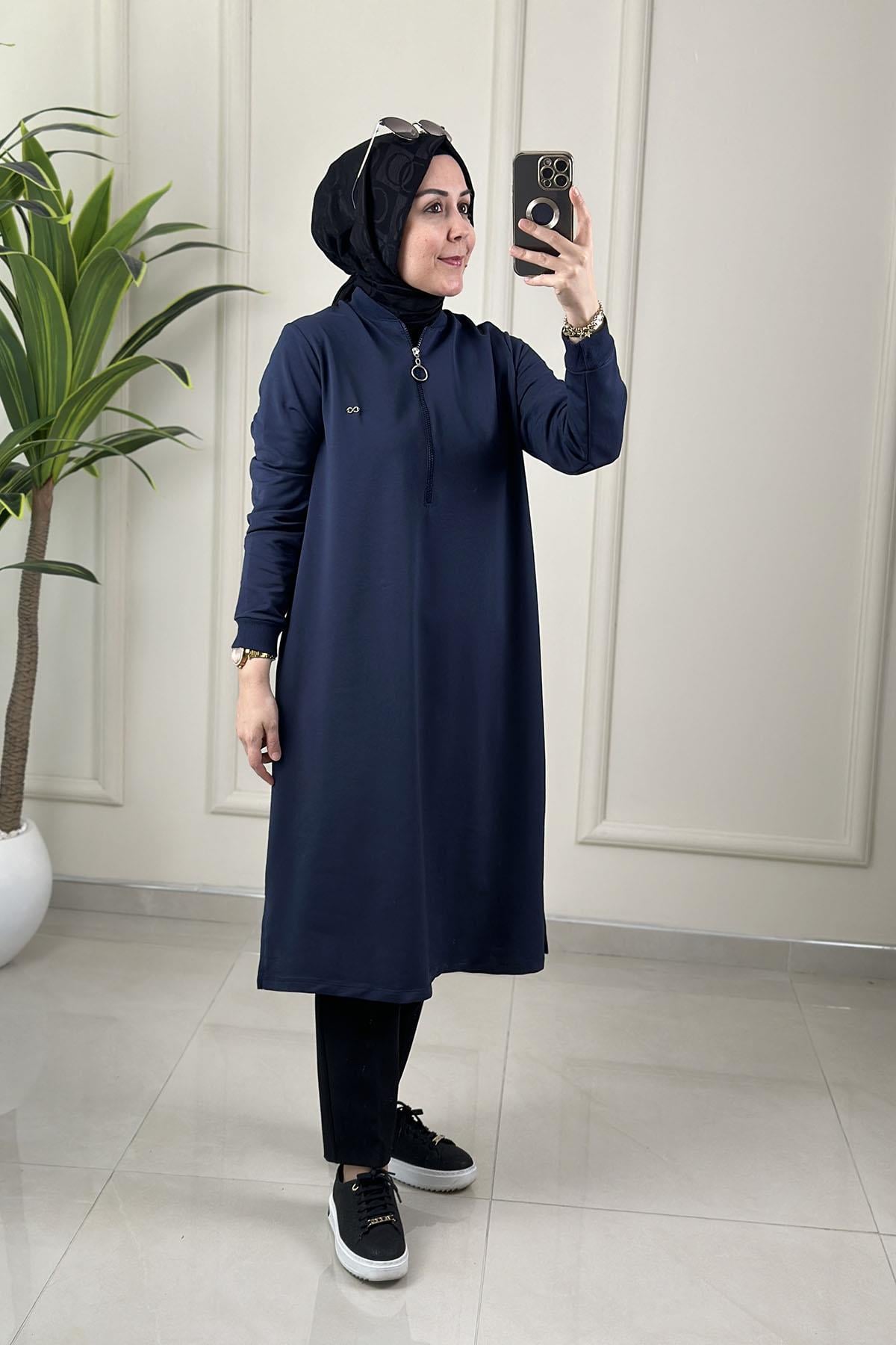 Tesettür Tunik ModelleriYaka ve Kol Ribanalı Önü Fermuarlı Kadın Tunik Lacivert KADO 262630