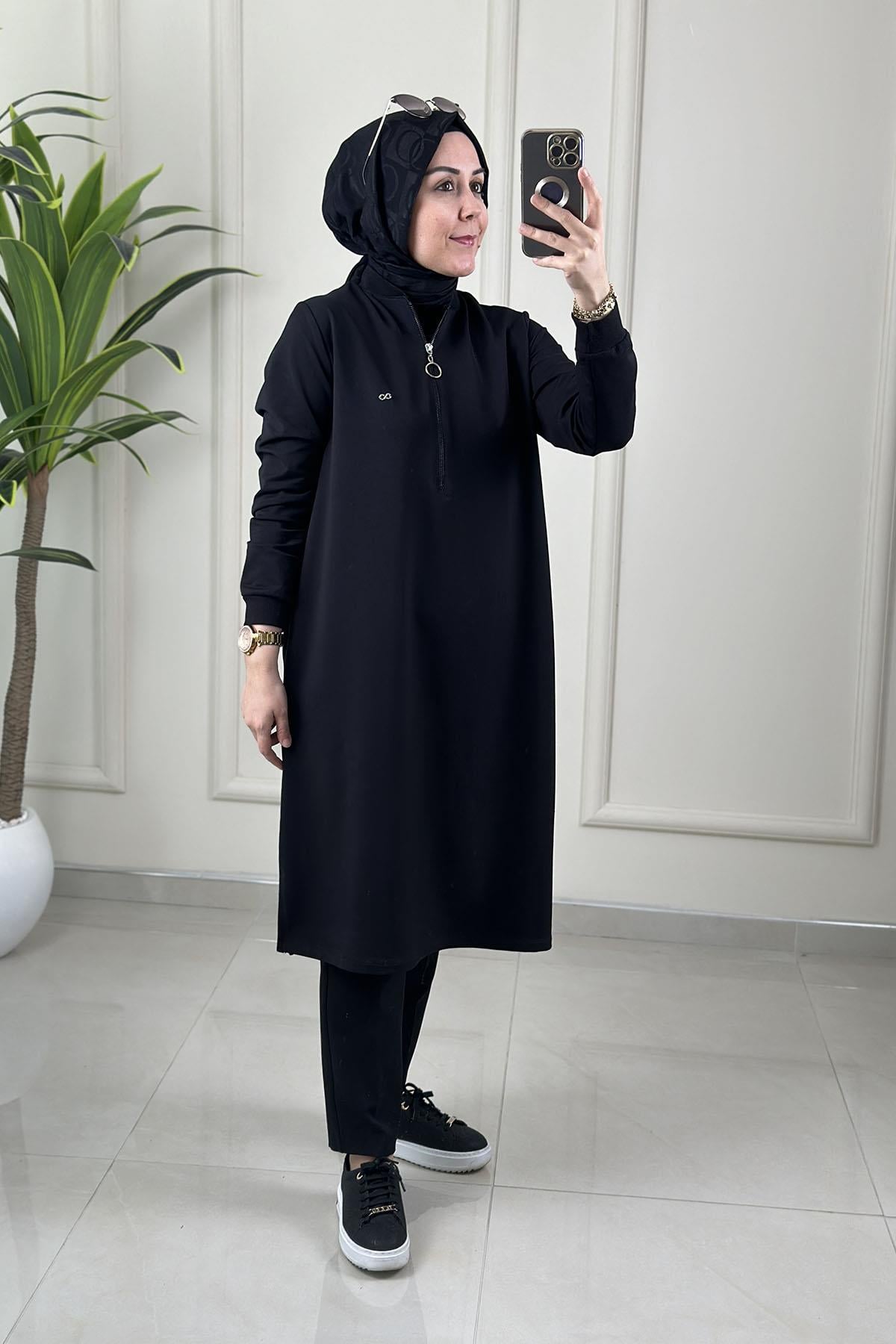 Tesettür Tunik ModelleriYaka ve Kol Ribanalı Önü Fermuarlı Kadın Tunik Siyah KADO 262630