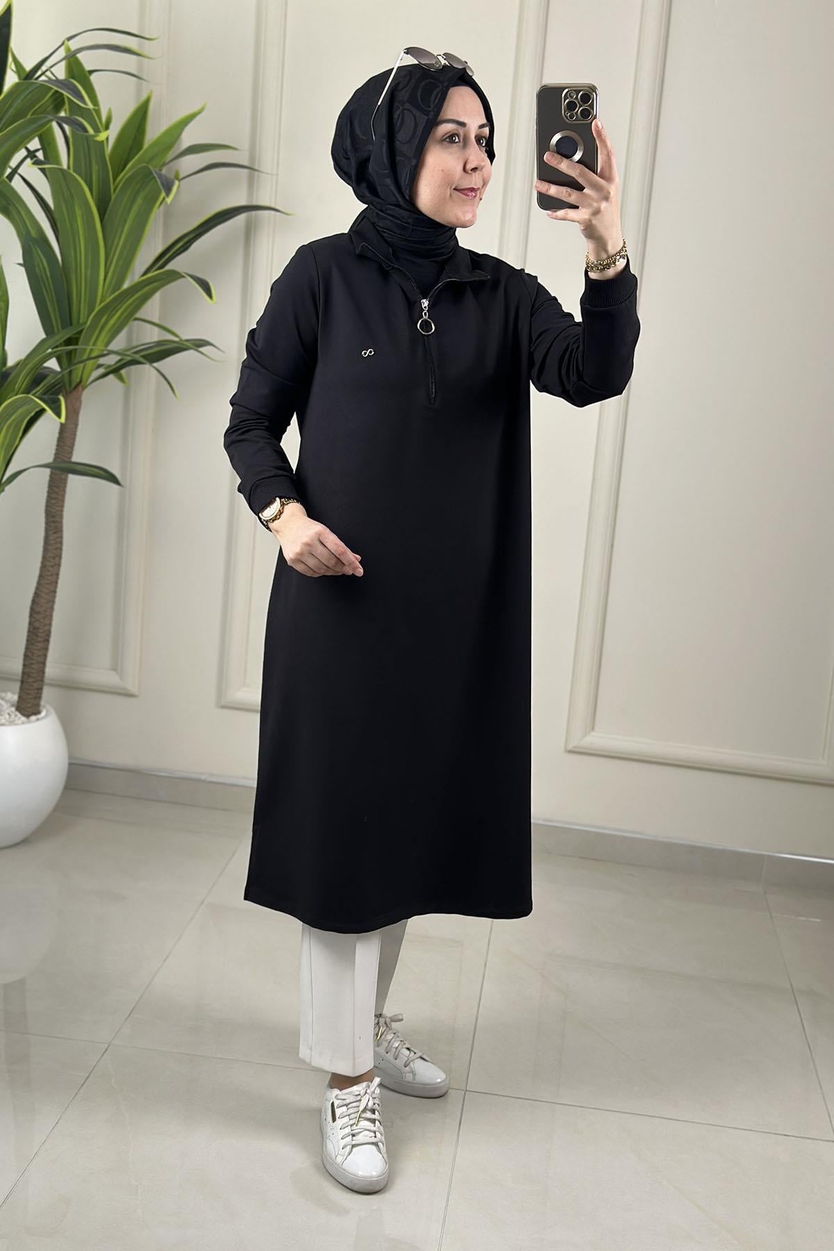 Tesettür Tunik ModelleriYaka ve Kol Ribanalı Önü Yarım Fermuarlı Kadın Tunik Siyah KADO 257322
