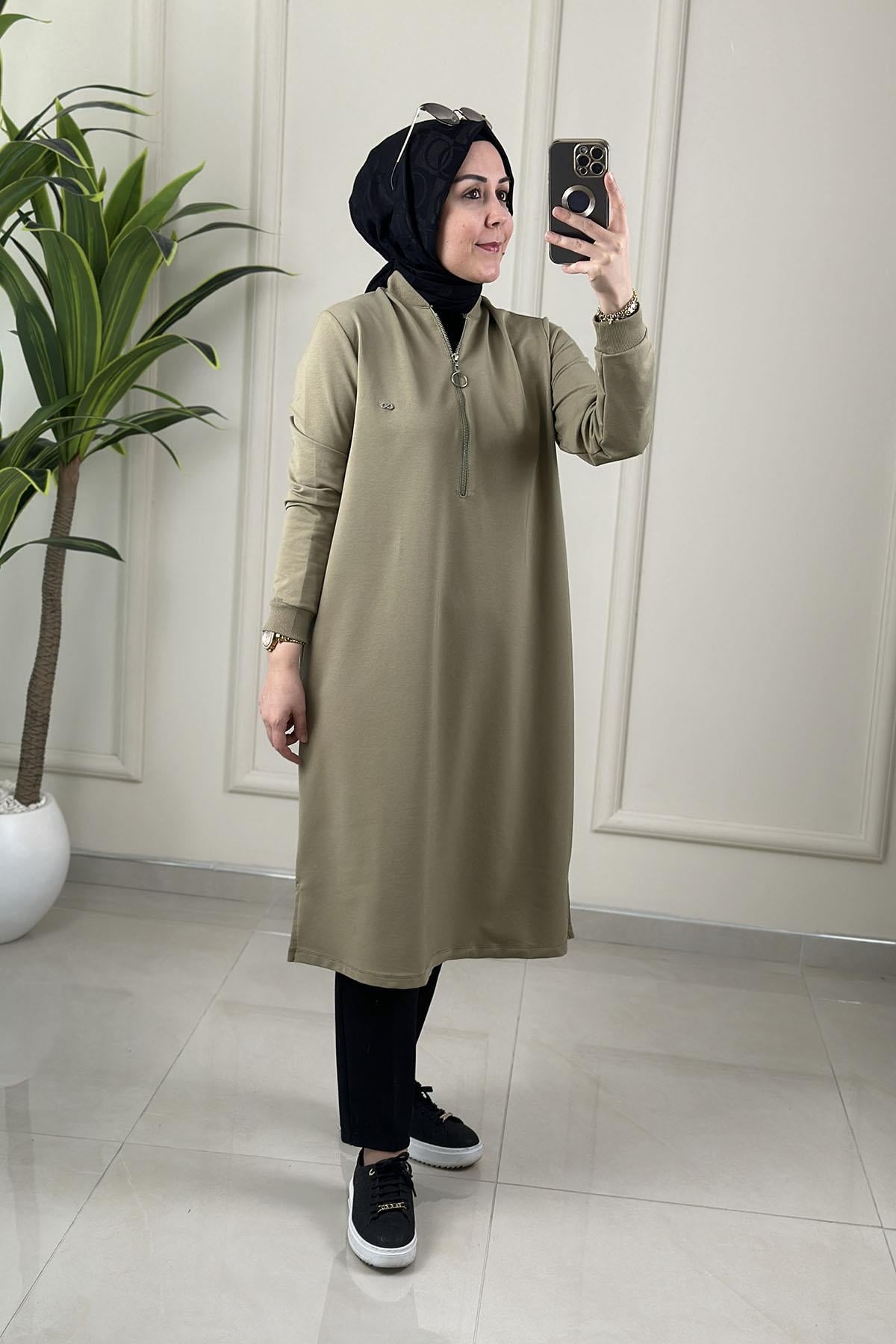Tesettür Tunik ModelleriYaka ve Kol Ribanalı Önü Fermuarlı Kadın Tunik Açık Yeşil KADO 262630