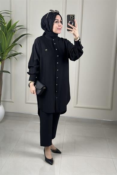 Tesettür Tunik ModelleriÖnü Düğmeli Aksesuar Detaylı Kadın Tunik Siyah KADO 262622
