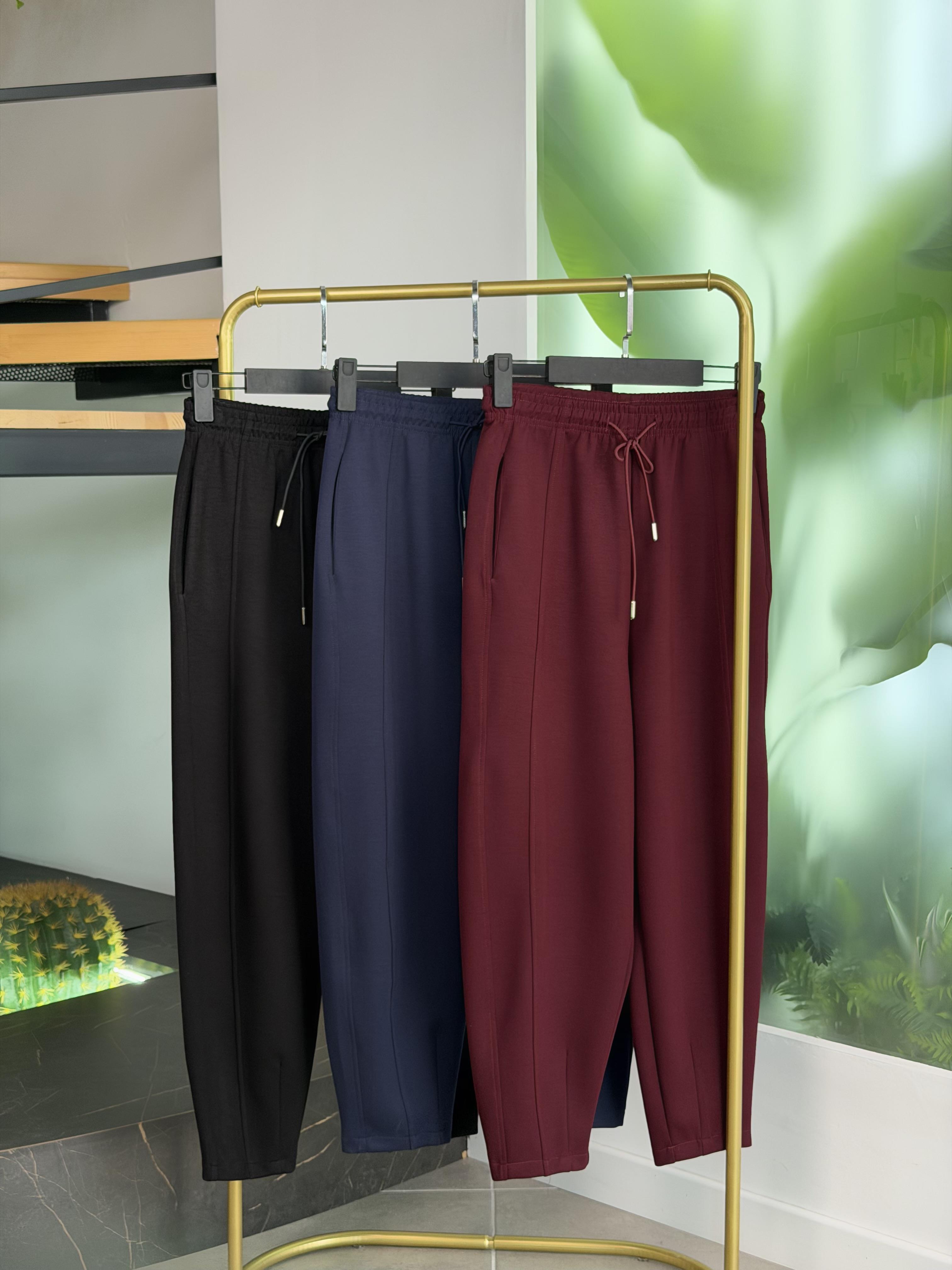Bordo Renk Kesik Detaylı Konik Pantolon