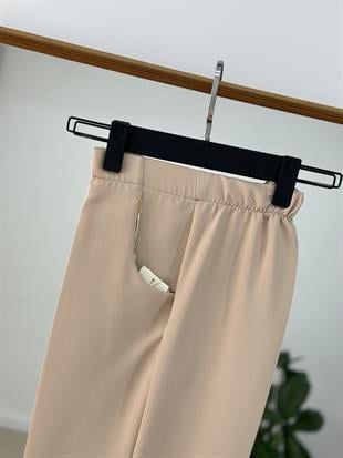 Beli Lastikli Bej Renk Bol Paça Pantolon