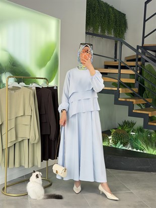 Mavi Renk Bluzu Asimetrik Kesim Etekli Takım