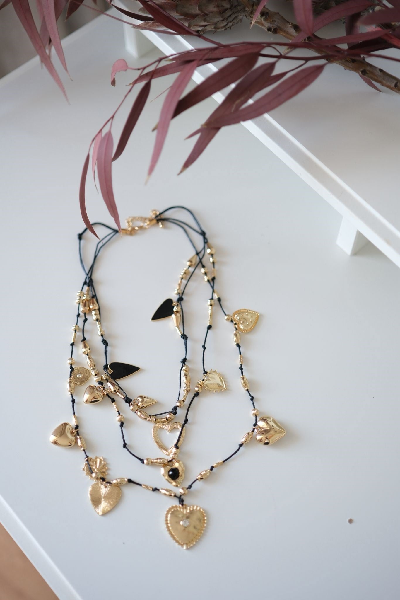 PİSSA SİYAH İPLİ BRONZ GOLD KOLYE