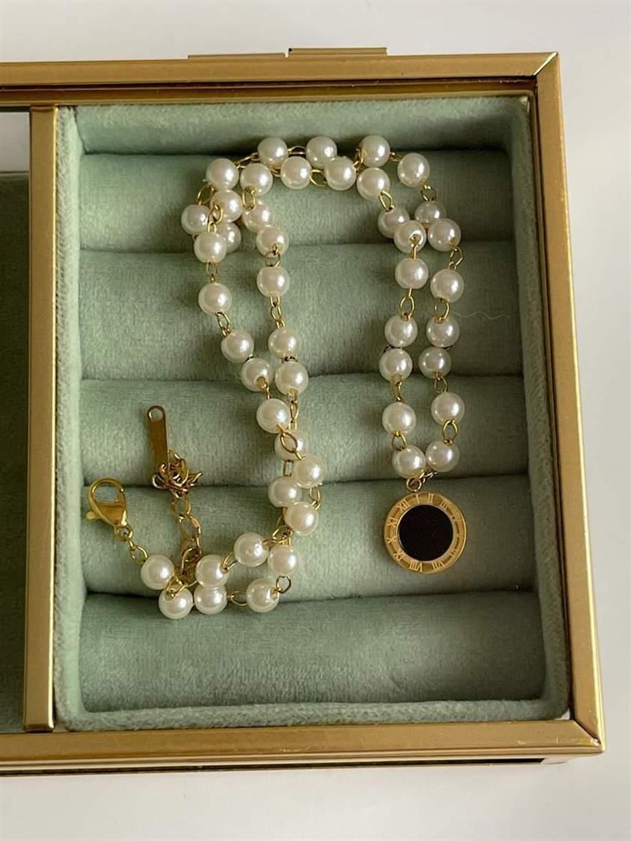 Çelik İncili Siyah Uçlu Marka Model Kolye (47 Cm)