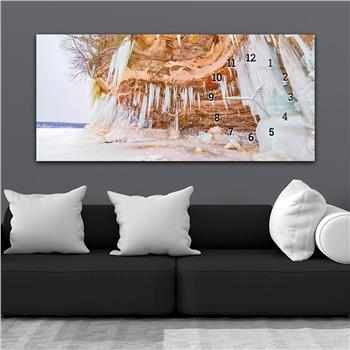 Horizontal bedrucktes Glas mit Kunst und Naturthema und einer Uhr an der Seite 125