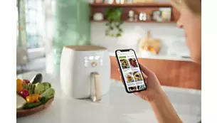  NutriU uygulamasından 500'den fazla özel tarif⁴  Lezzetli, sağlıklı ve hızlıca hazırlayabileceğiniz ağzınıza layık yüzlerce Airfryer tarifini keşfedin. NutriU uygulamasındaki tarifler, günlük pişirme için beslenme uzmanları tarafından hazırlanır.