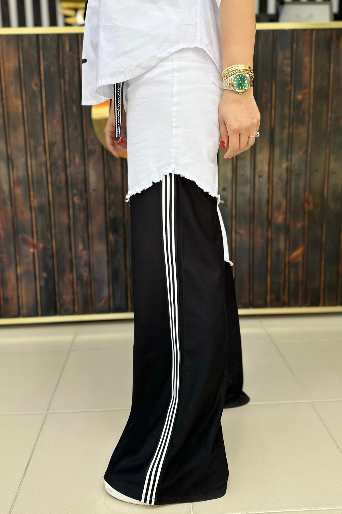 SİYAH BEYAZ GEÇİŞLİ KEMERLİ JEAN BÜYÜK BEDEN