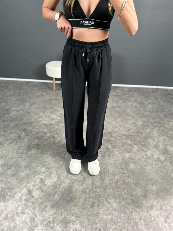 MD Siyah Tensel Dokulu Beli Lastikli Pantolon 