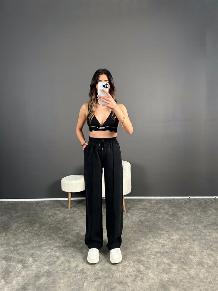 MD Siyah Tensel Dokulu Beli Lastikli Pantolon 