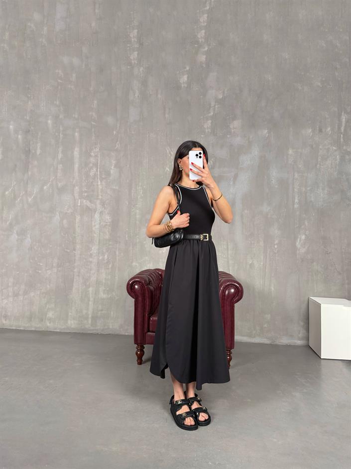فستان لون أسود قماش مزيج بوبلين مضلّع بأكمام صفرية مع شق وجيب Gaus00172