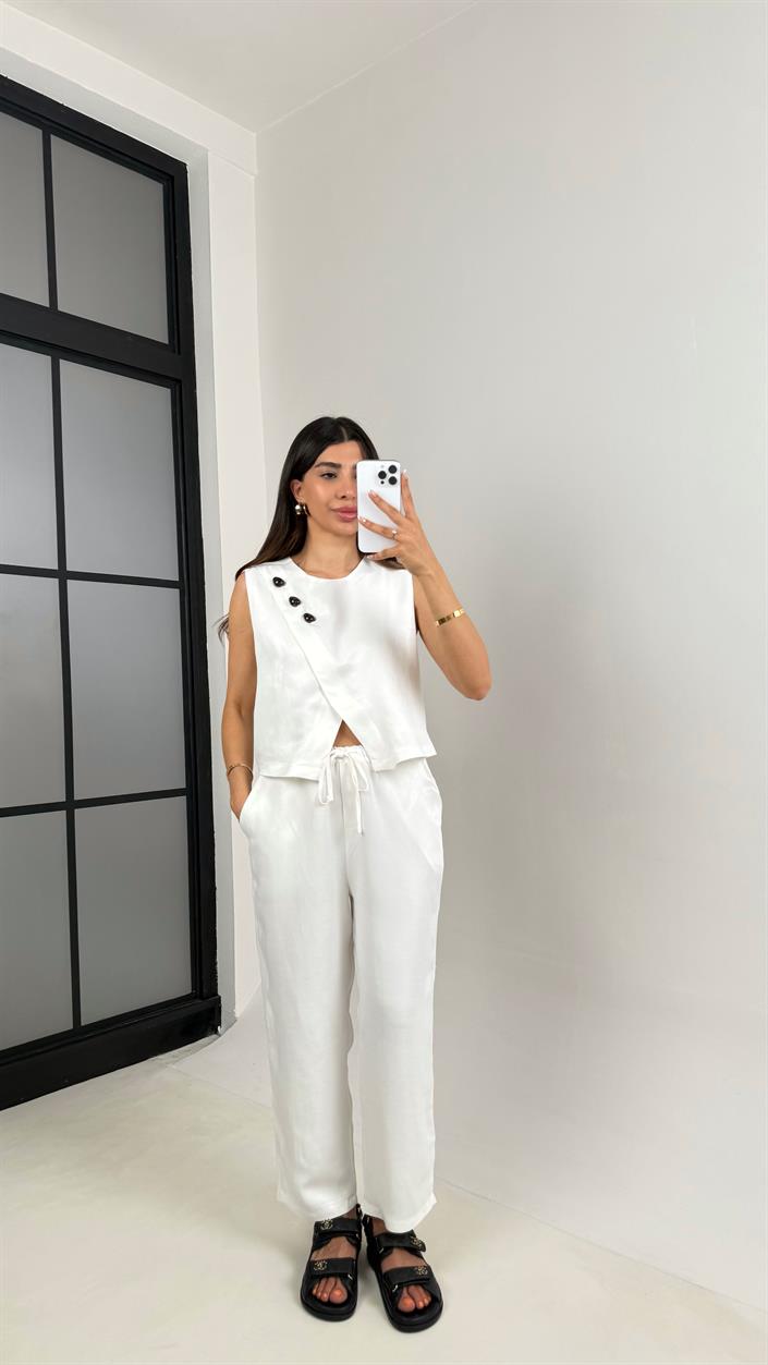 Beyaz Parlak Çapraz Düğme Detaylı Asimetrik Bluz Beli Lastikli Pantolon İkili Takım Gaus00569