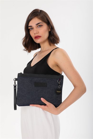 Denigma Clutch