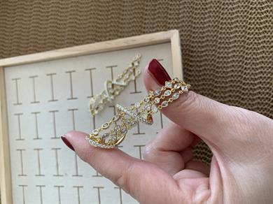 Vip Gold Kıvrımlı Zirkon Taş Sallantılı Tasarım Küpe