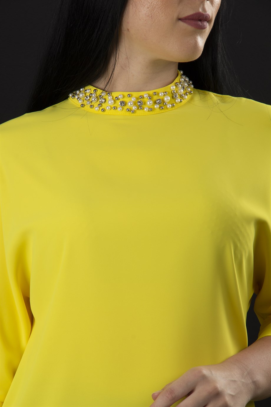yellow high neck blouse
