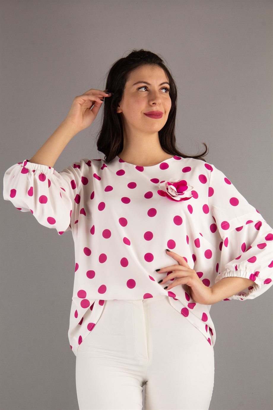 pink and black polka dot blouse