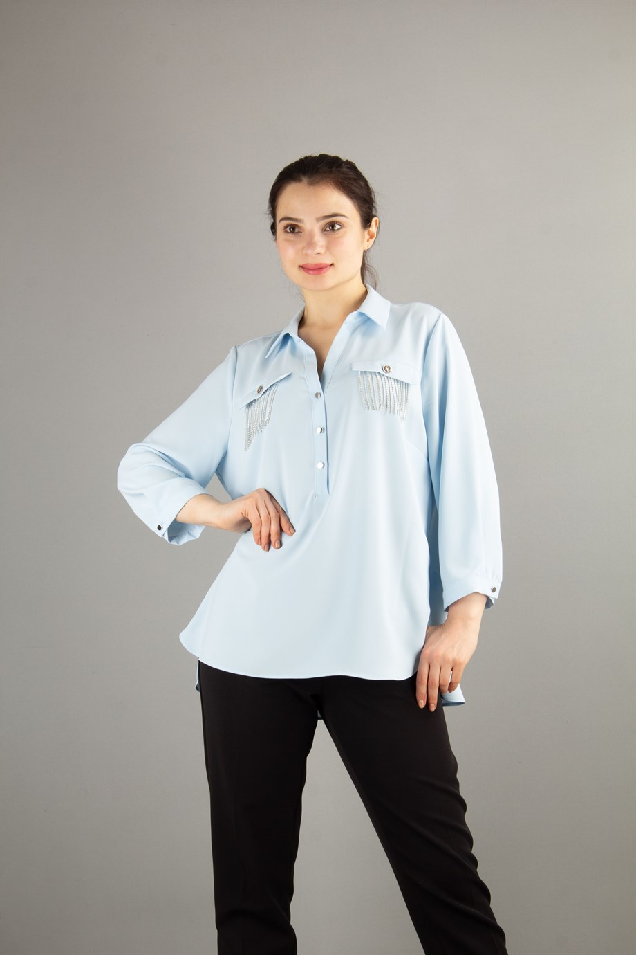 Button Down Shirt with Pockets and Strong Shoulders.